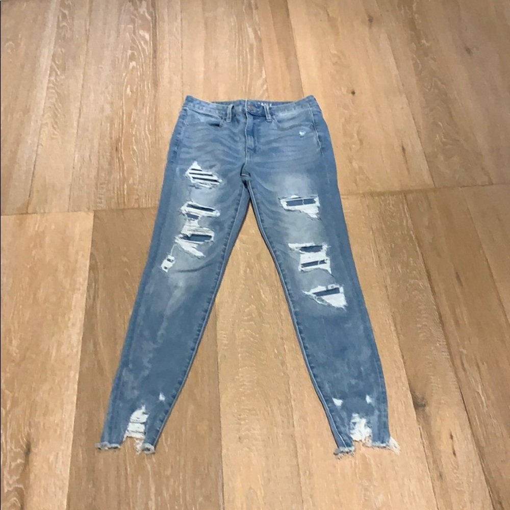 Light wash distressed skinny jeans
